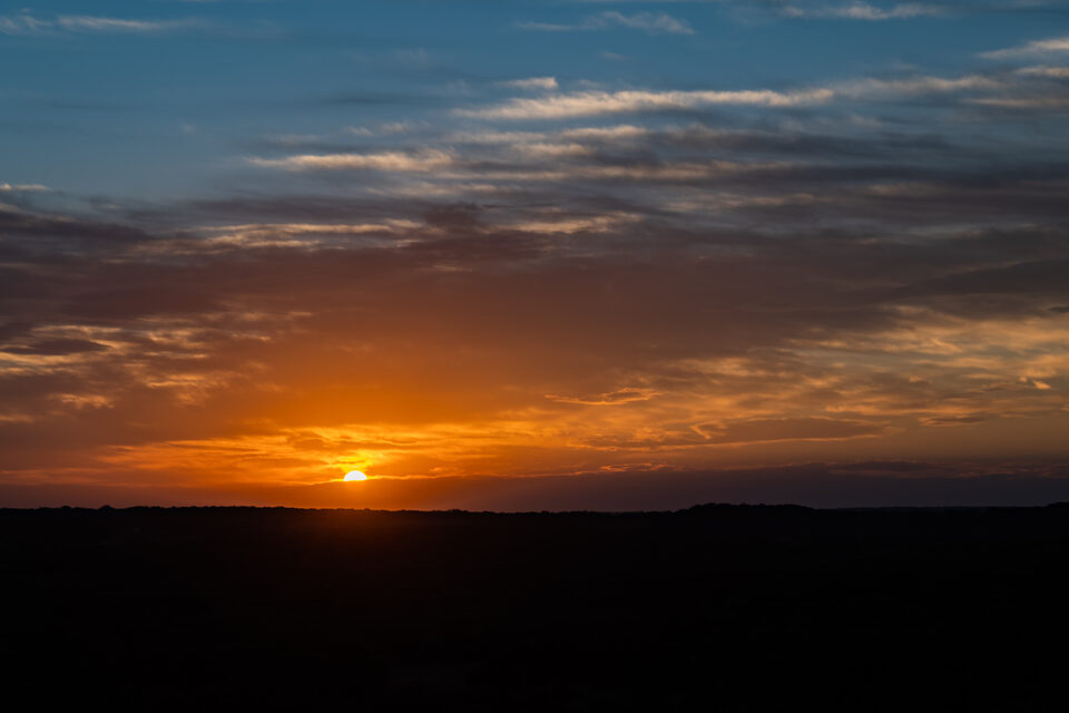 The Pedernales River over limestone ledges at sunset